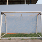 Jak skonstruować i zamontować sztuczny mur piłkarski aby zapewnić bezpieczeństwo i wydajność?